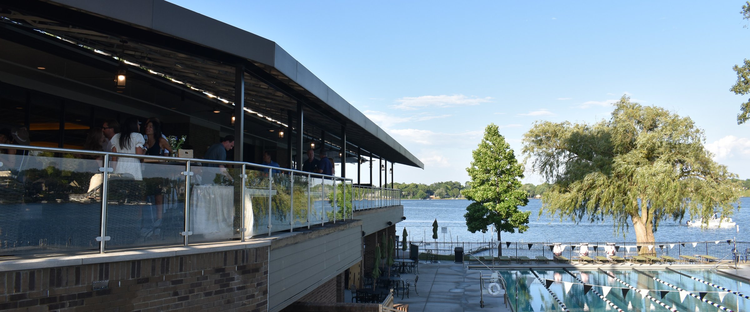 The clubhouse terrace above the pool and lake